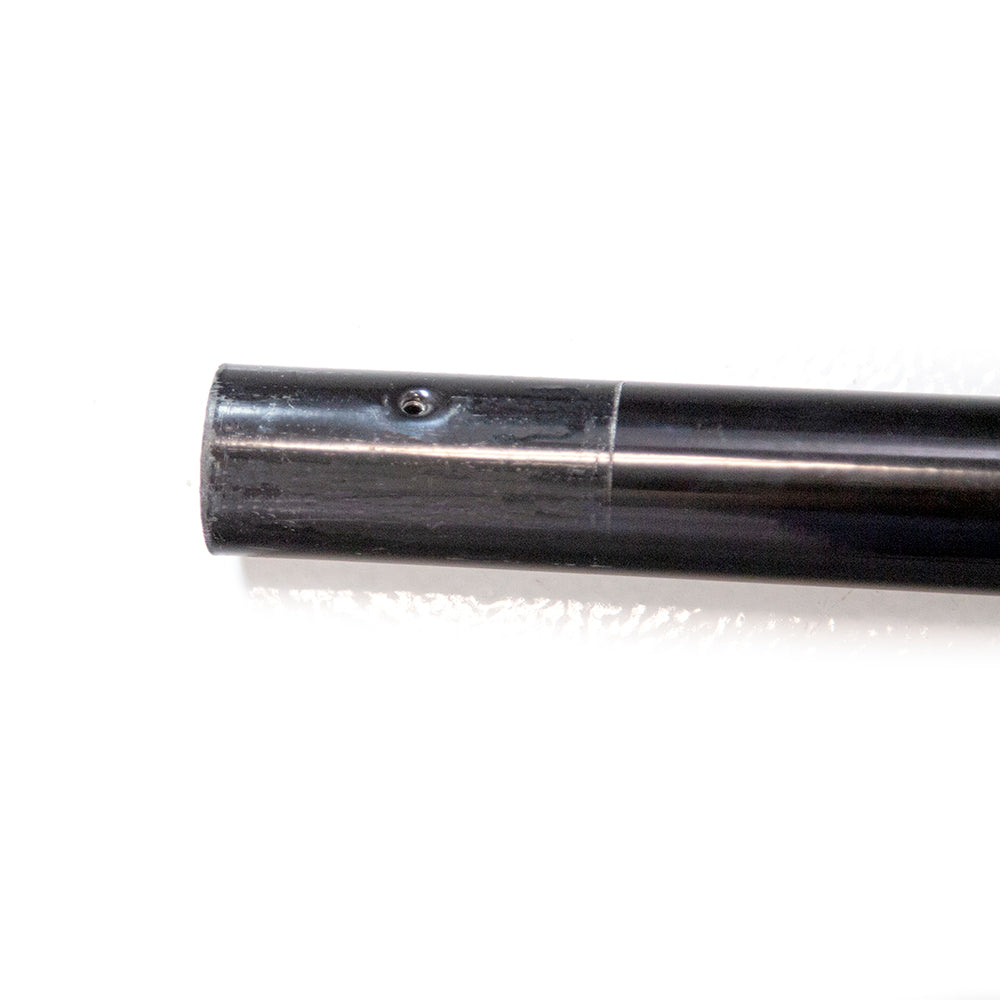 Close-up view of one end of the black leg extension part.