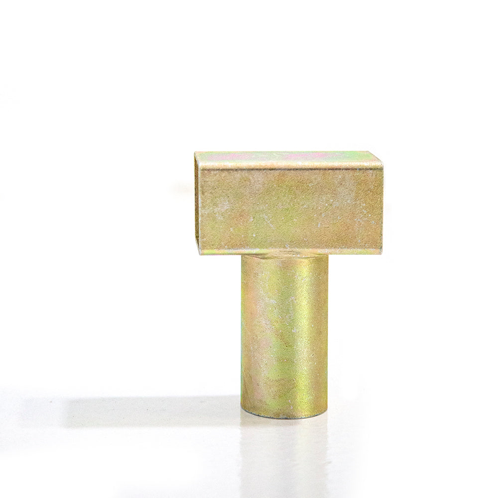 Gold-colored T-joint.