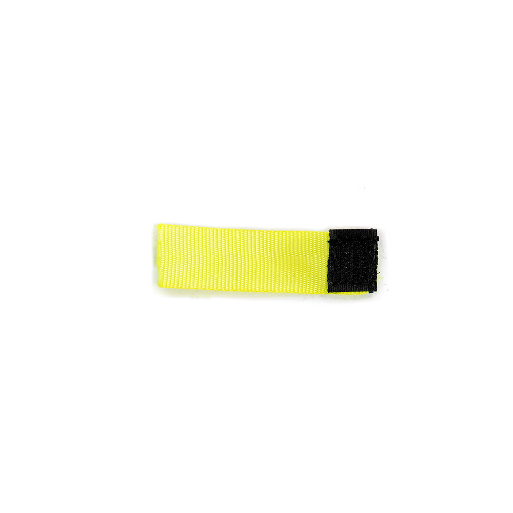 Replacement yellow score tab with black Velcro on it.