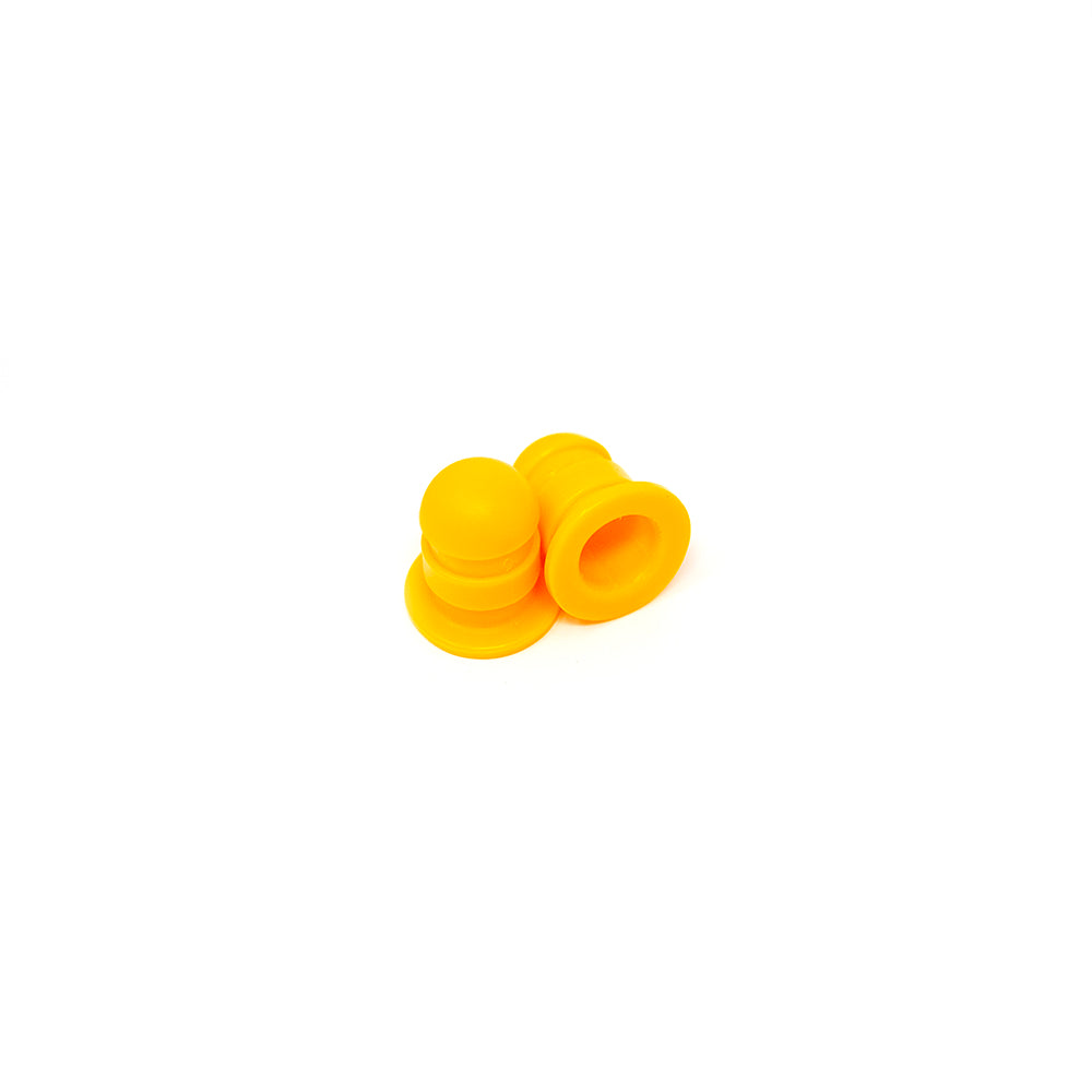 Two mini yellow pole caps.