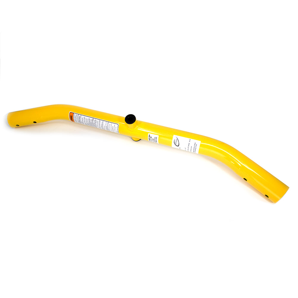 Yellow rotation pole with warning labels on it.