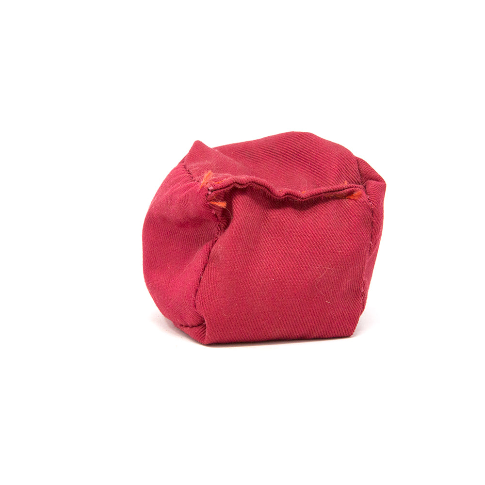Red bean bag for trampoline toss games.