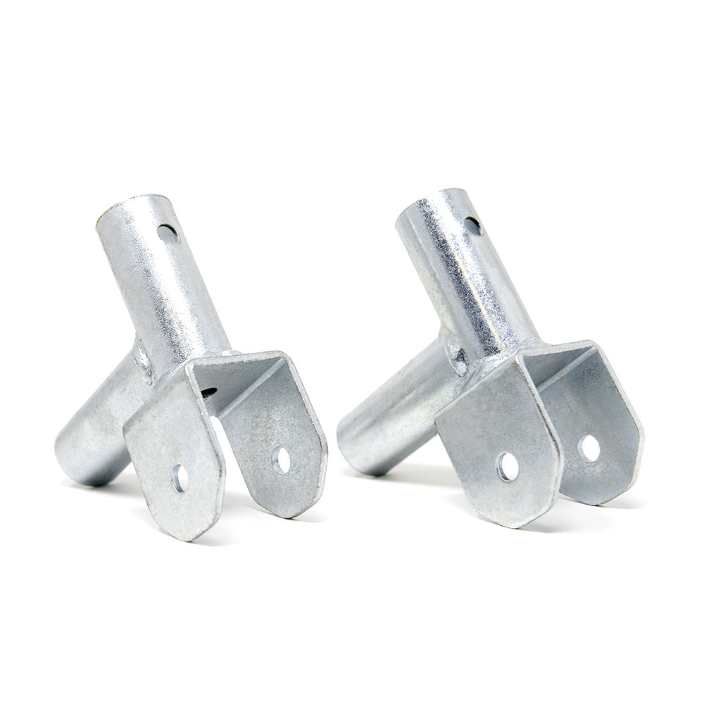 Two corner socket pieces sitting next to each other.