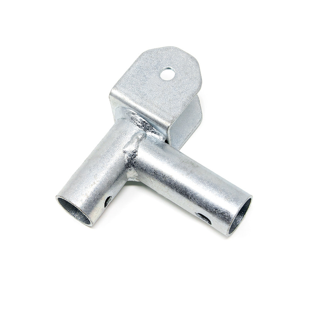 Steel corner socket replacement piece laying on its side.