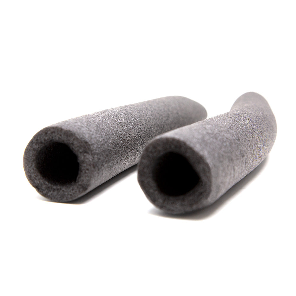 Dark gray foam pieces used to cover metal poles.