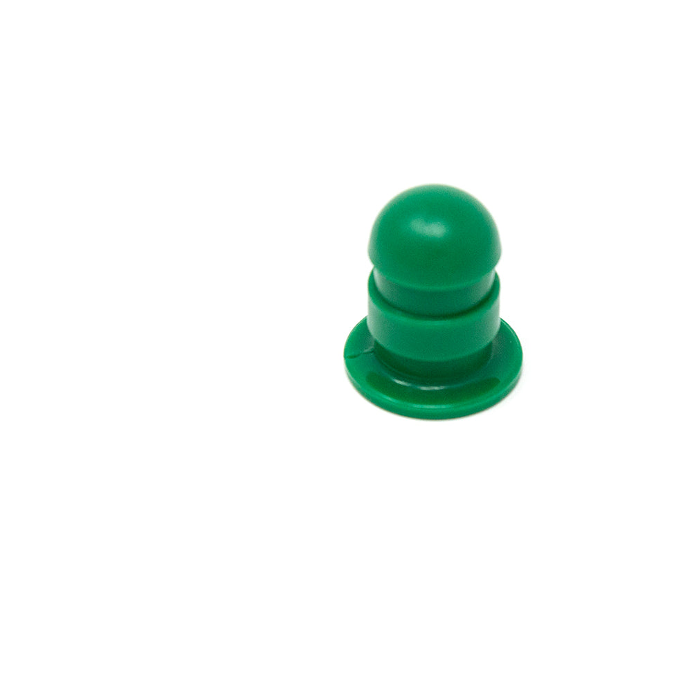 Small green cap goes on top of mini trampoline enclosure poles.