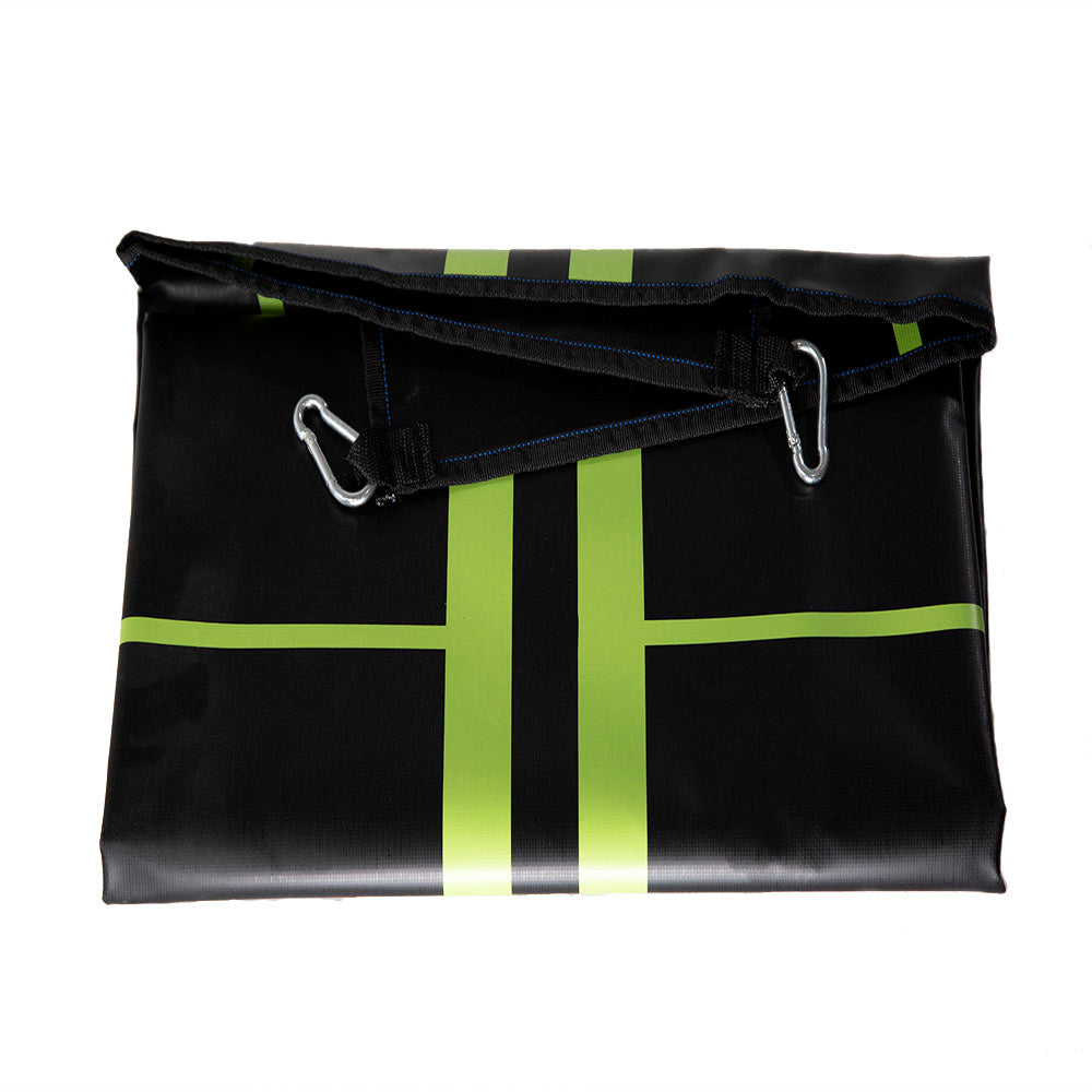 Replacement target mat is folded with the metal clips on top.