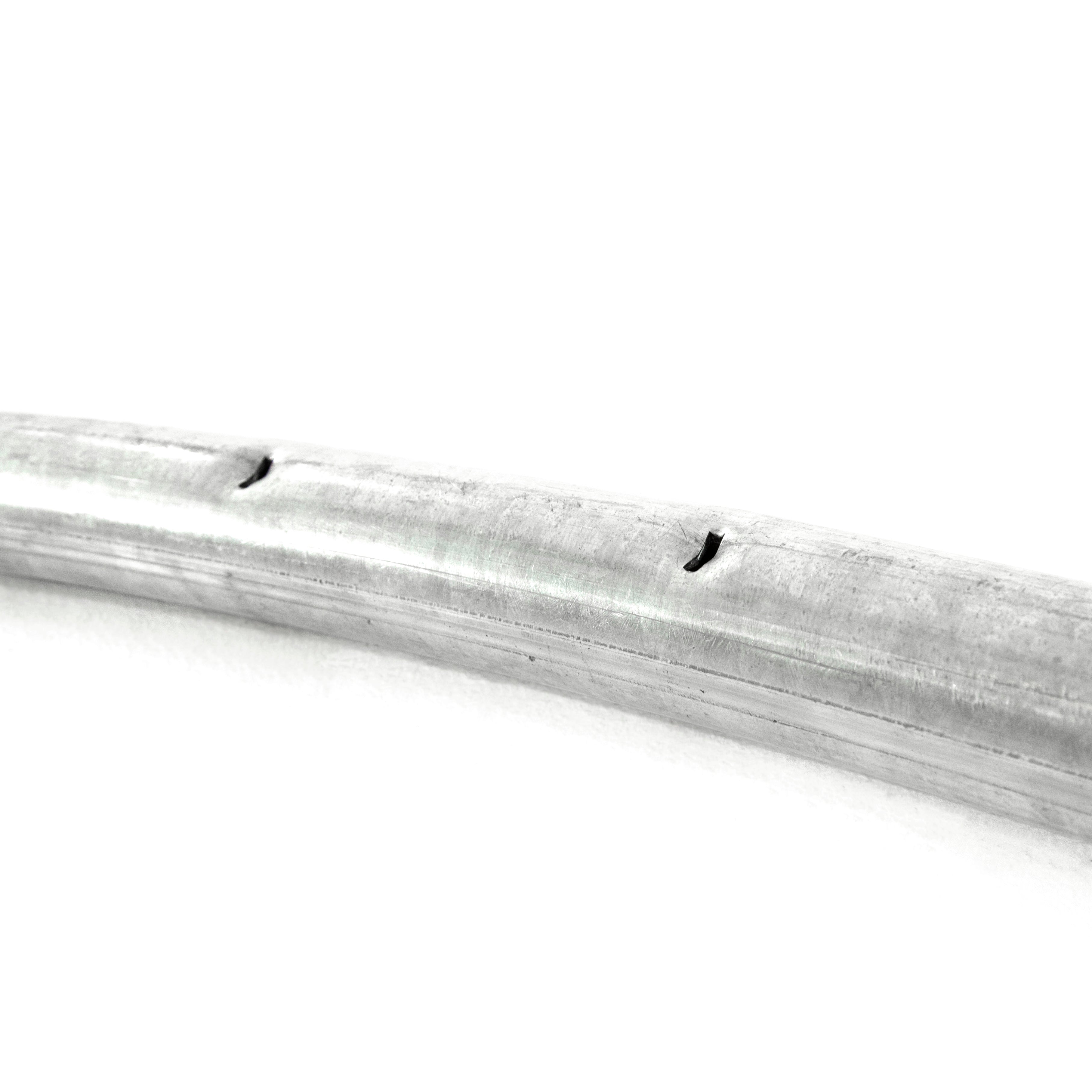 Close-up view of the holes for the springs to hook into on the top tube.