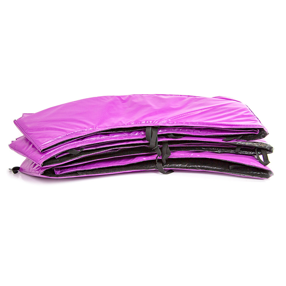 Purple spring pad has black straps to help keep it on the trampoline frame.