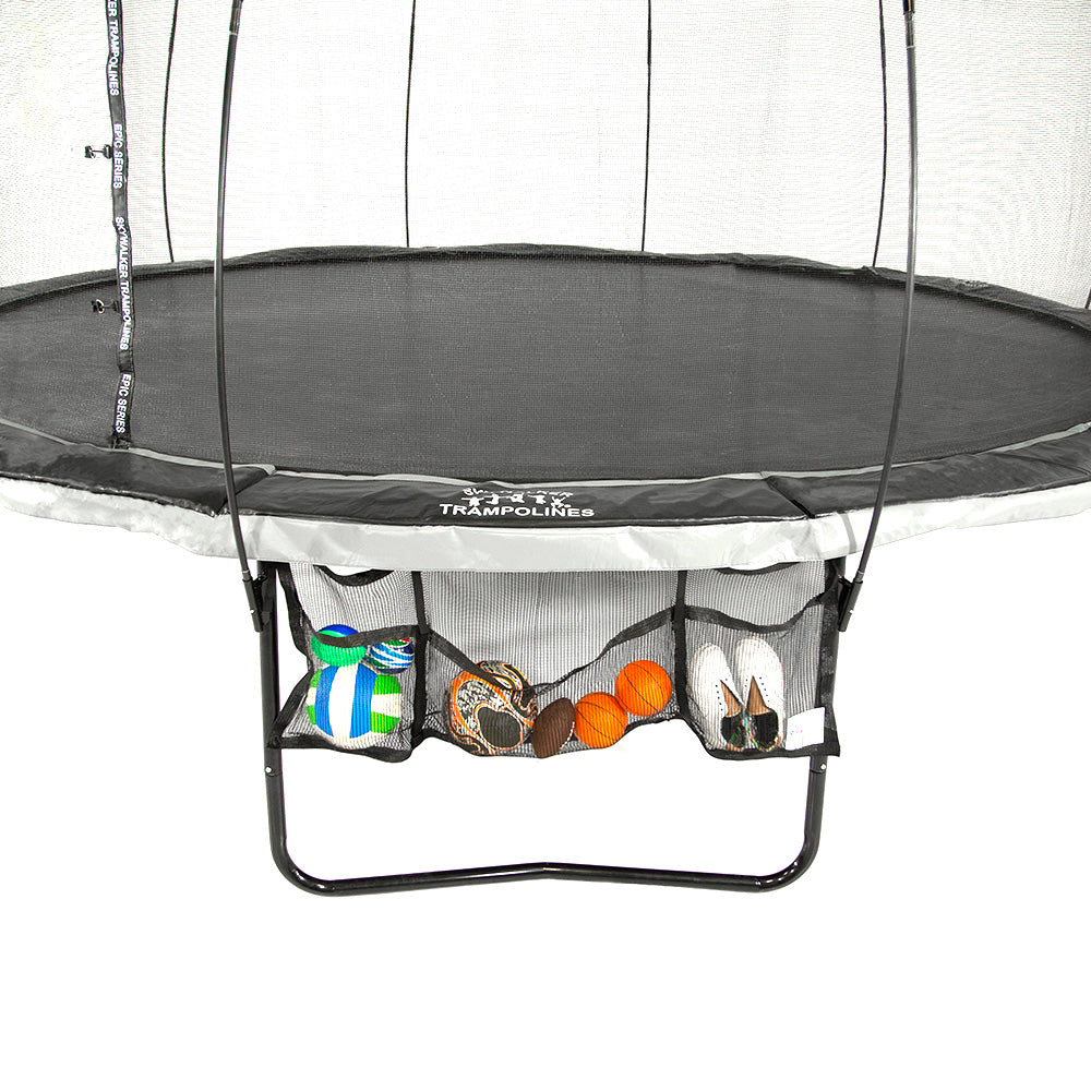1 pocket holds a volleyball and 2 small balls, 1 pocket holds a soccer ball and 3 small balls, and 1 pocket holds shoes.
