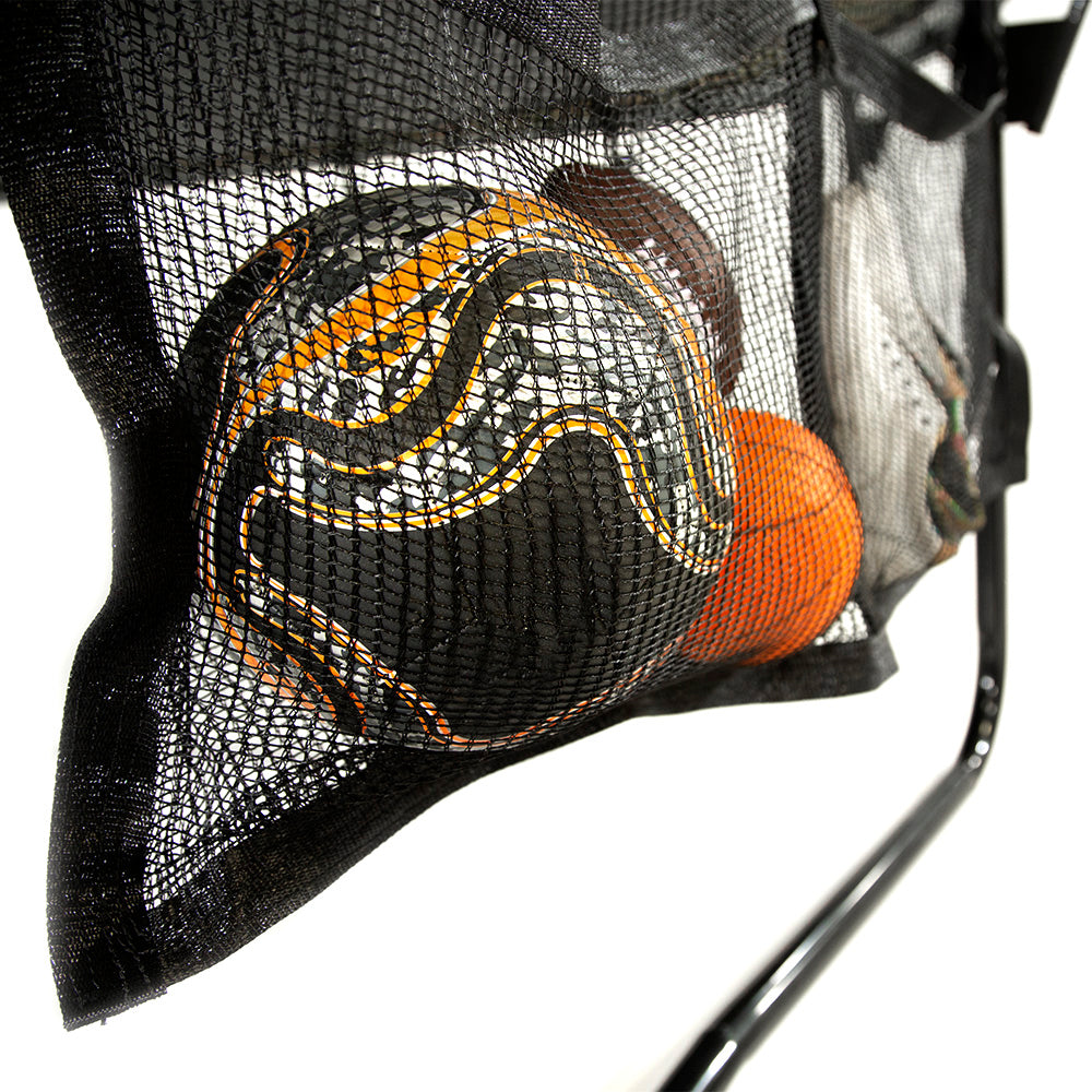 One storage pocket is holding a full-sized soccer ball, a mini basketball, and a mini football.