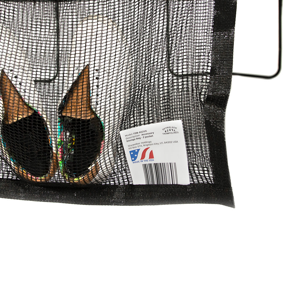 Close-up view of the "Made in the USA" tag on the pocket that is holding the shoes.