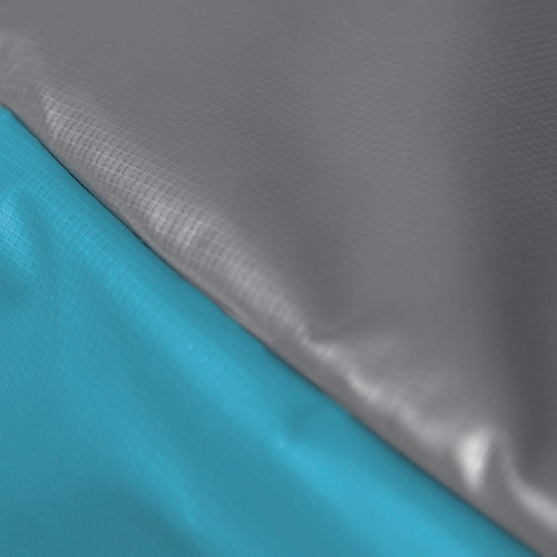 Close-up swatch of the light blue and gray spring pad.