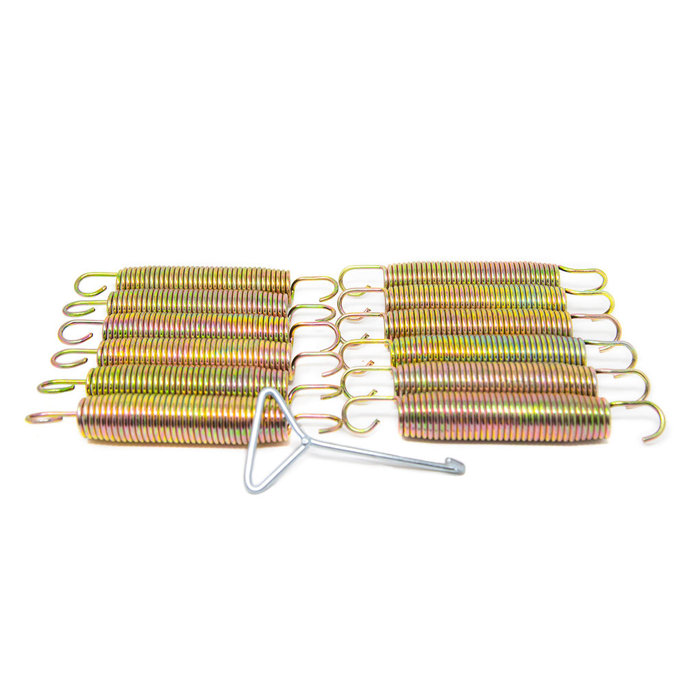 Two piles of springs evenly lined up with a spring puller in front of them.