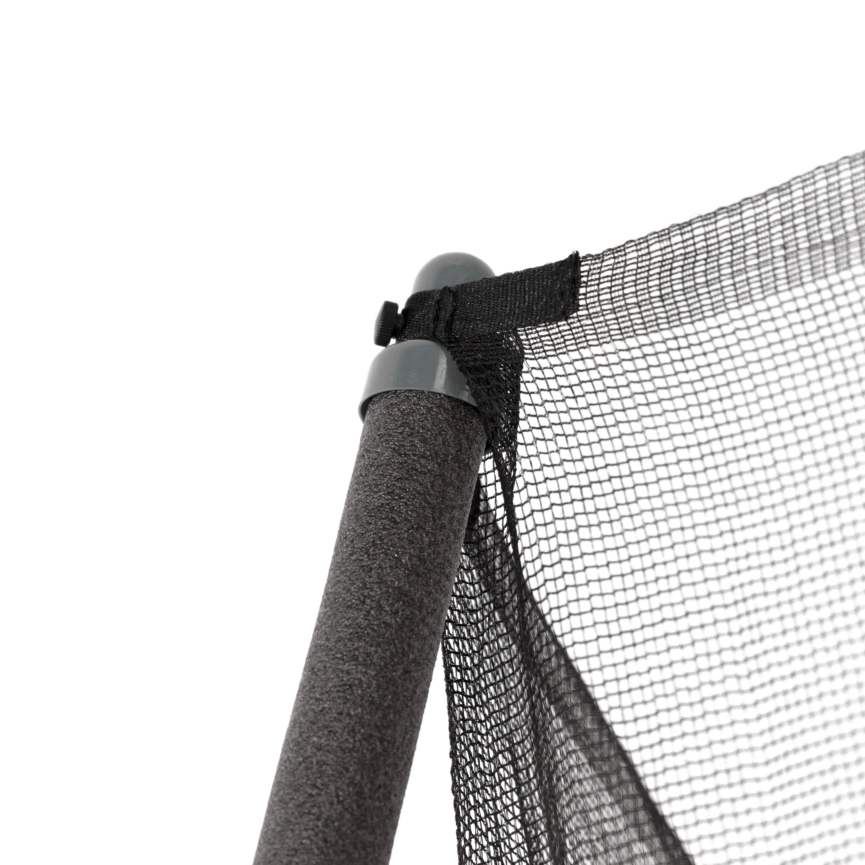The black plastic pole cap sits atop the enclosure pole and is wrapped up by the enclosure net strap.