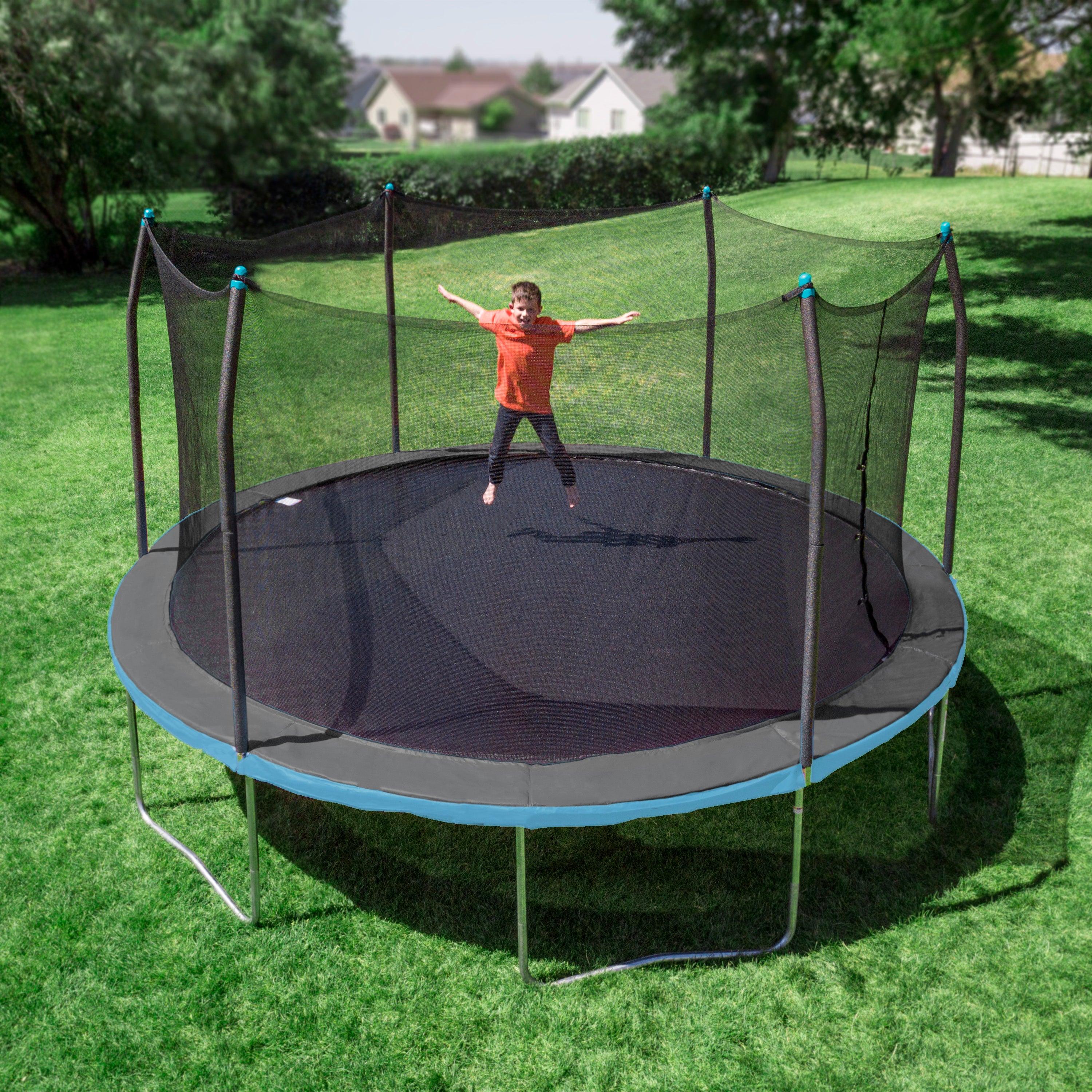 Kid playing on the 15' round trampoline with gray and light blue spring pad.