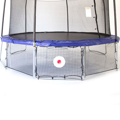 A trampoline with Kickback Game net attached to the legs of the trampoline. Kickback Game net has red and white target. 