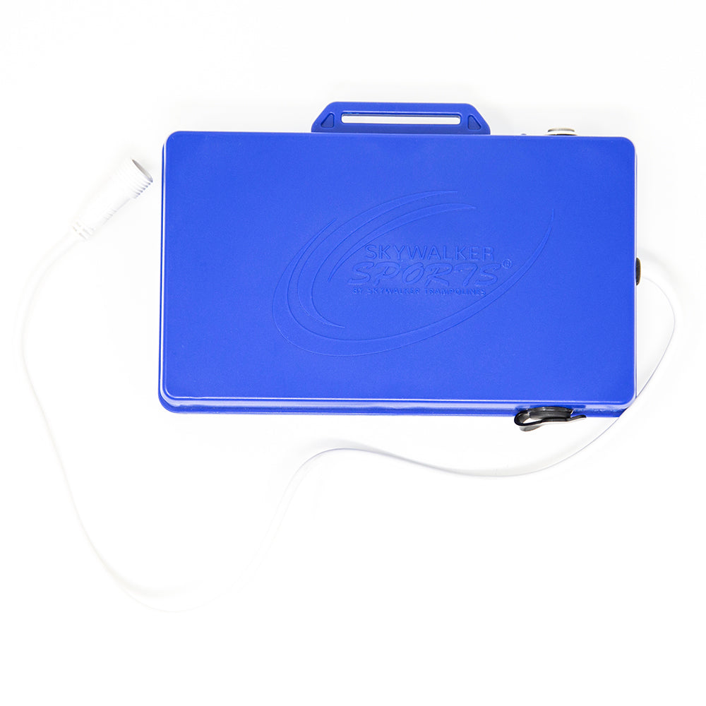Blue battery pack with white charging cord connected to it. 
