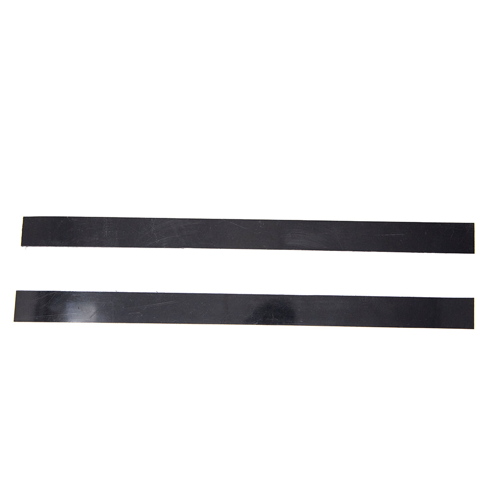 Black plastic strips as seen from above. 