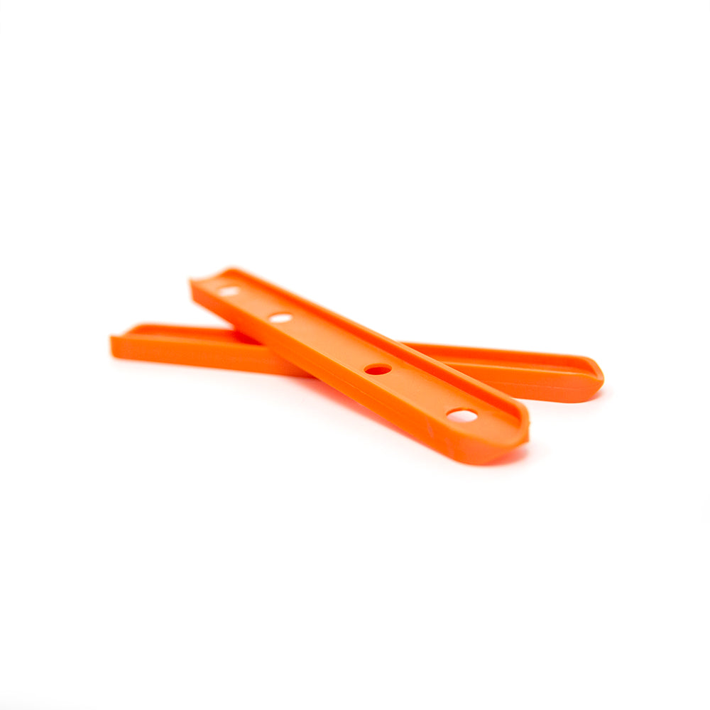 Orange leg spacers come in quantities of two. 