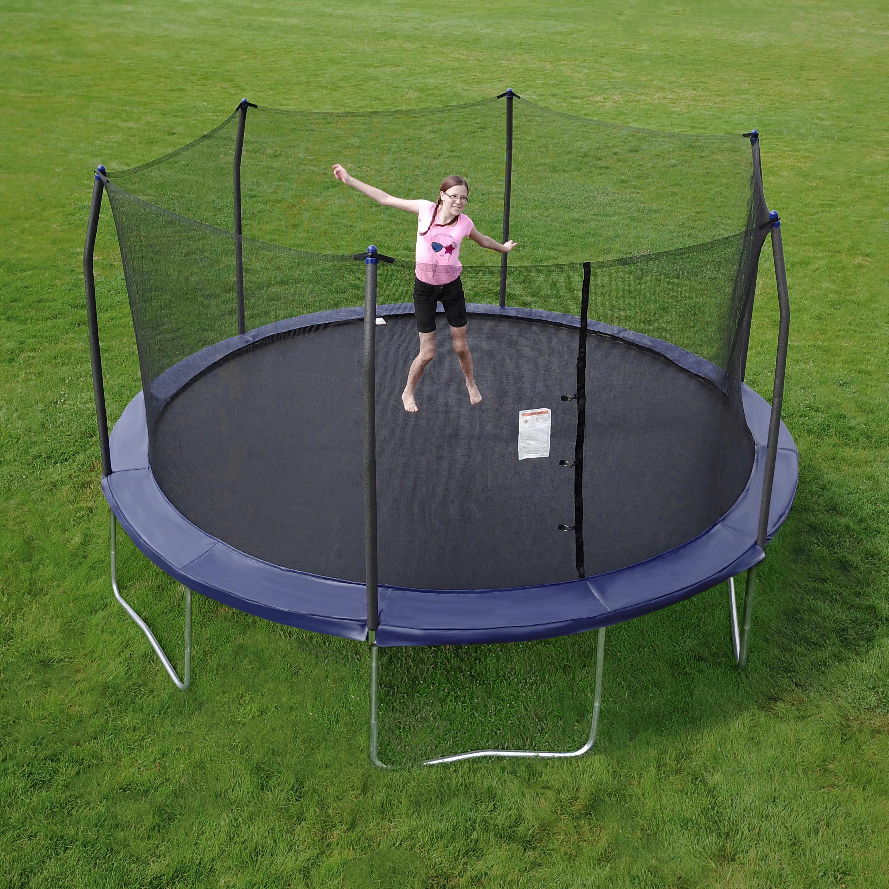 Girl bounces on the 15-foot round kids trampoline with navy spring pad. 