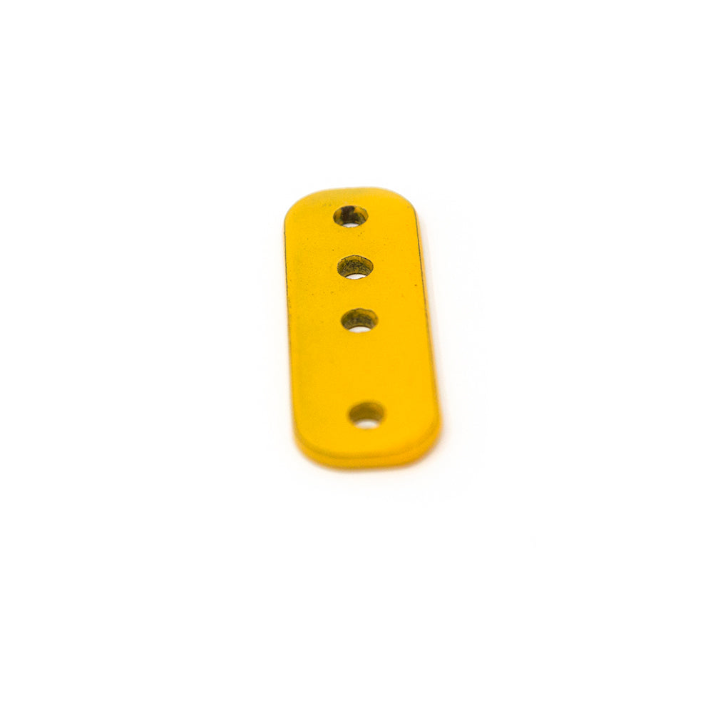 Plastic tension device is yellow on top.