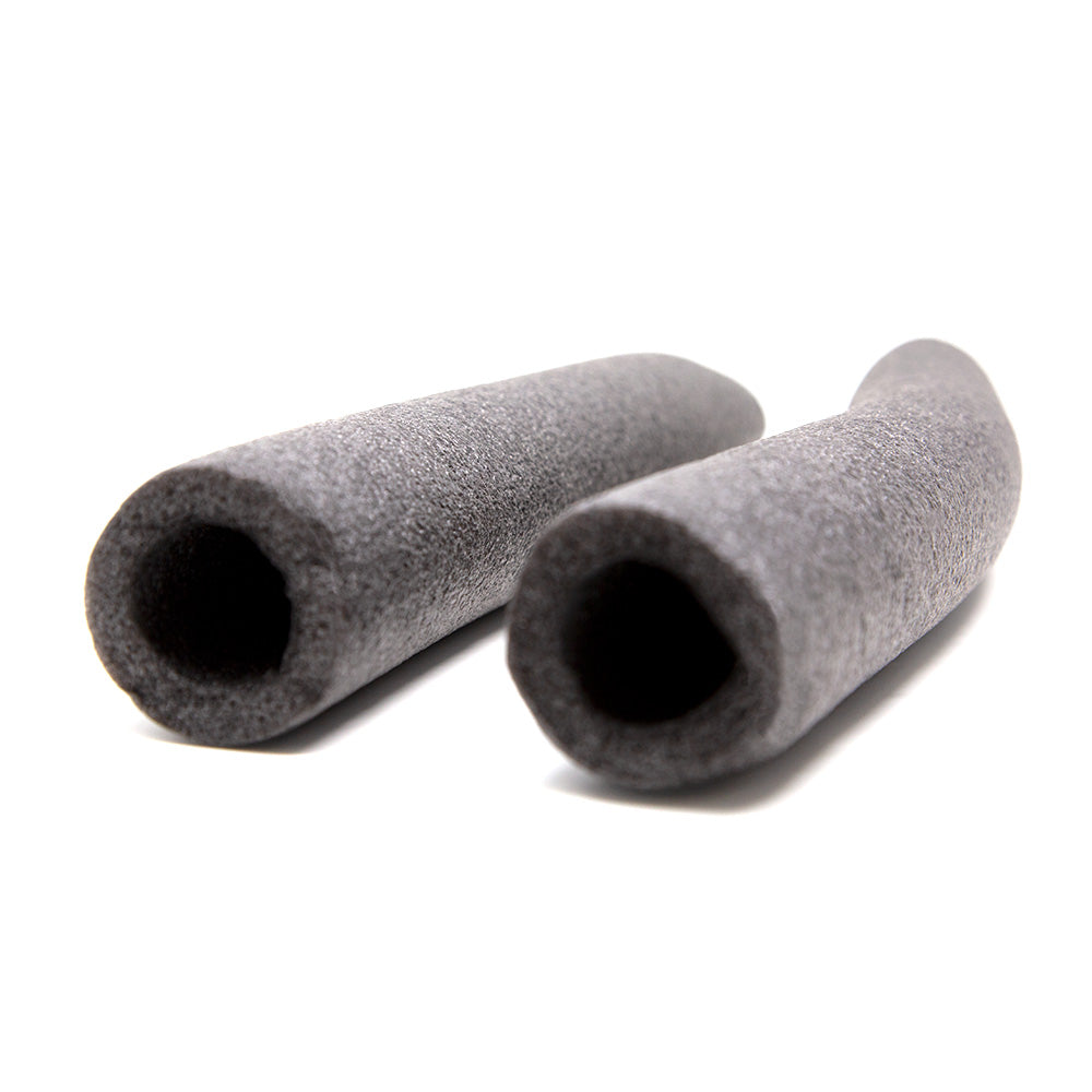 Dark gray foam pieces used to cover metal poles. 