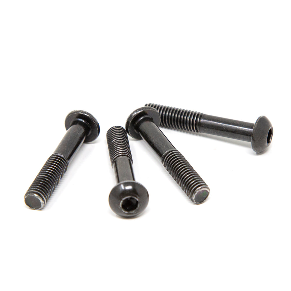 Four bolts facing two different directions.