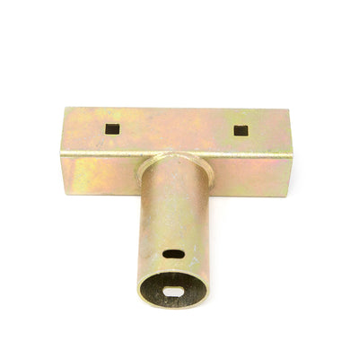 Gold-colored replacement T-joint part. 