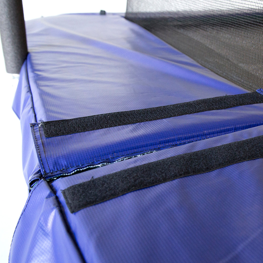 The trampoline spring pad comes in 2 L-shaped sections, and the two sections are connected by Velcro. 
