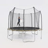 Three young children jump around on the 12-foot camo trampoline. 