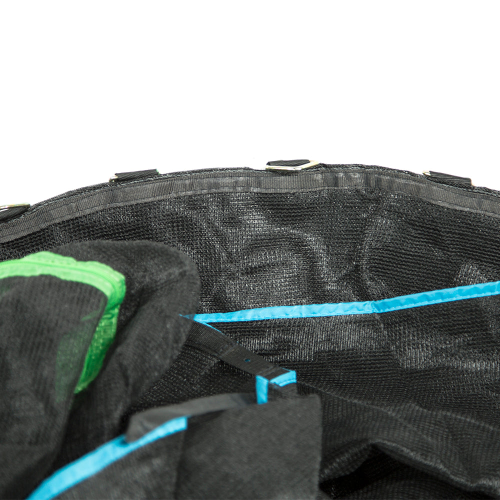 Close-up view of the black, green, and blue jump mat. 