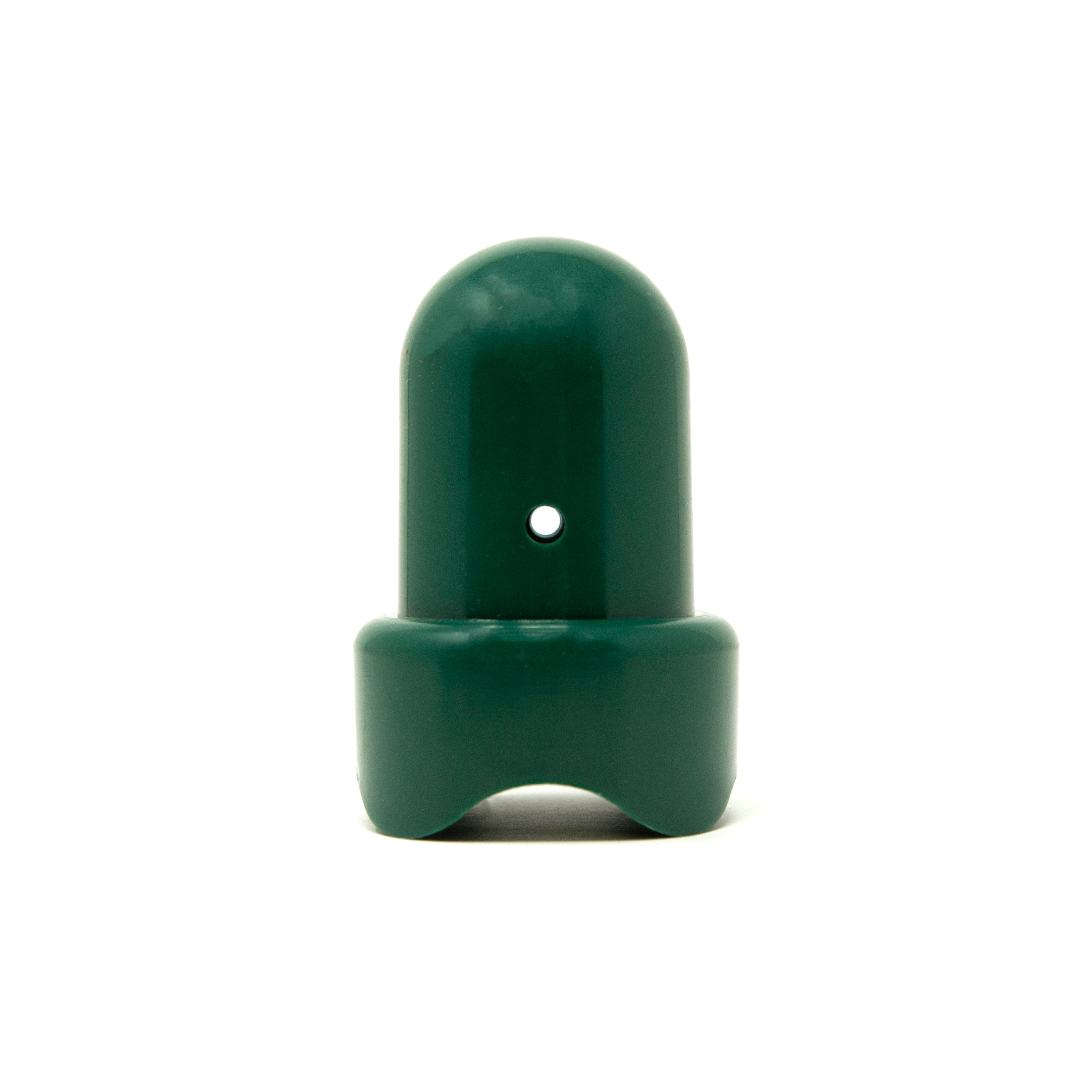 Dark green trampoline pole cap with the round hole facing out. 