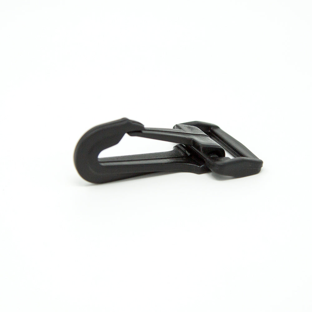 Black zipper clip lying flat. 