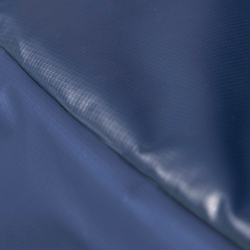 Close-up view of the trampoline's navy-colored spring pad. 