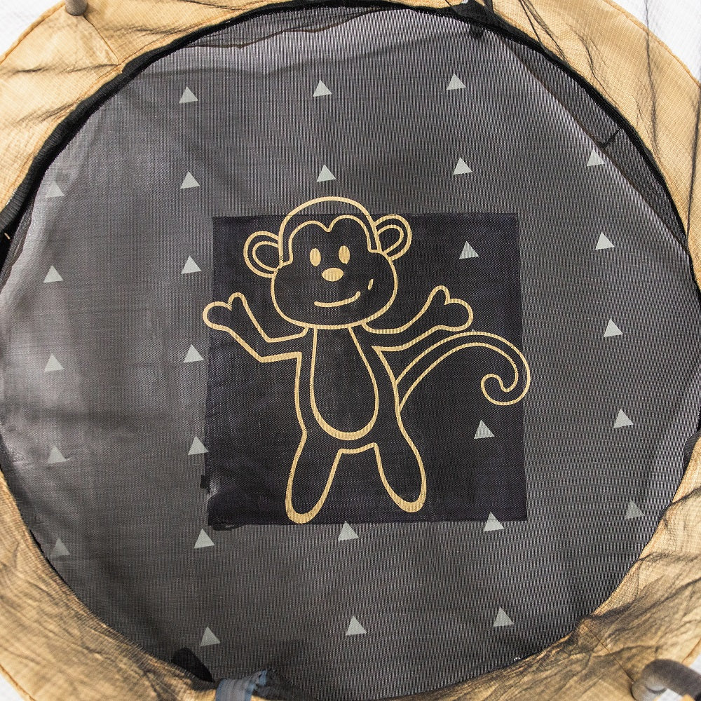 Black jump mat features a yellow monkey design with gray triangles surrounding it. 