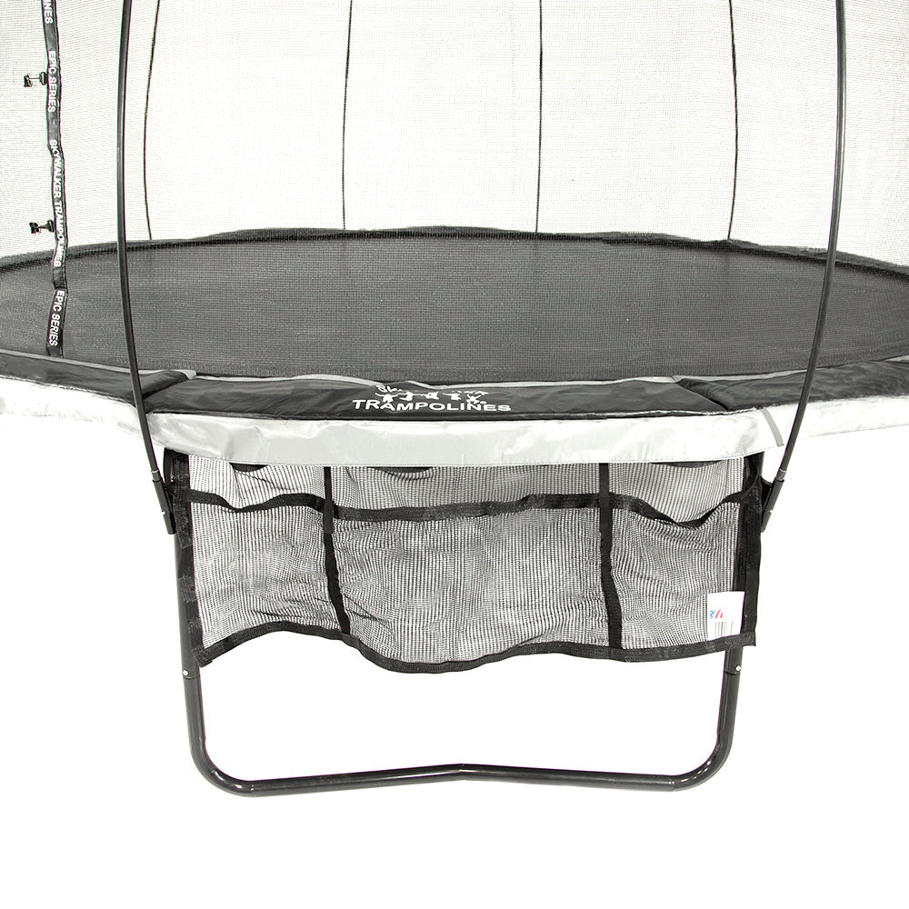 Front view of the Three Pocket Accessory Storage Bag hanging from a trampoline frame. 