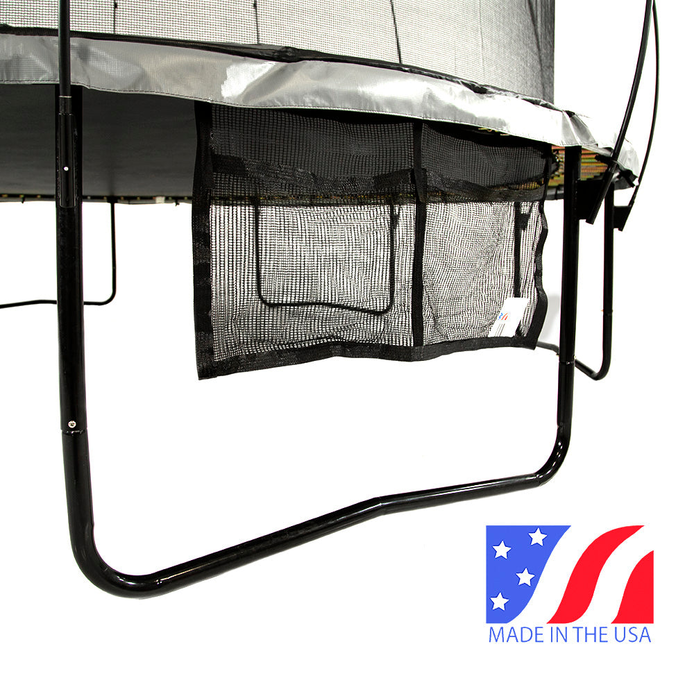 Side view of the Two Pocket Accessory Storage Bag hanging from a trampoline.