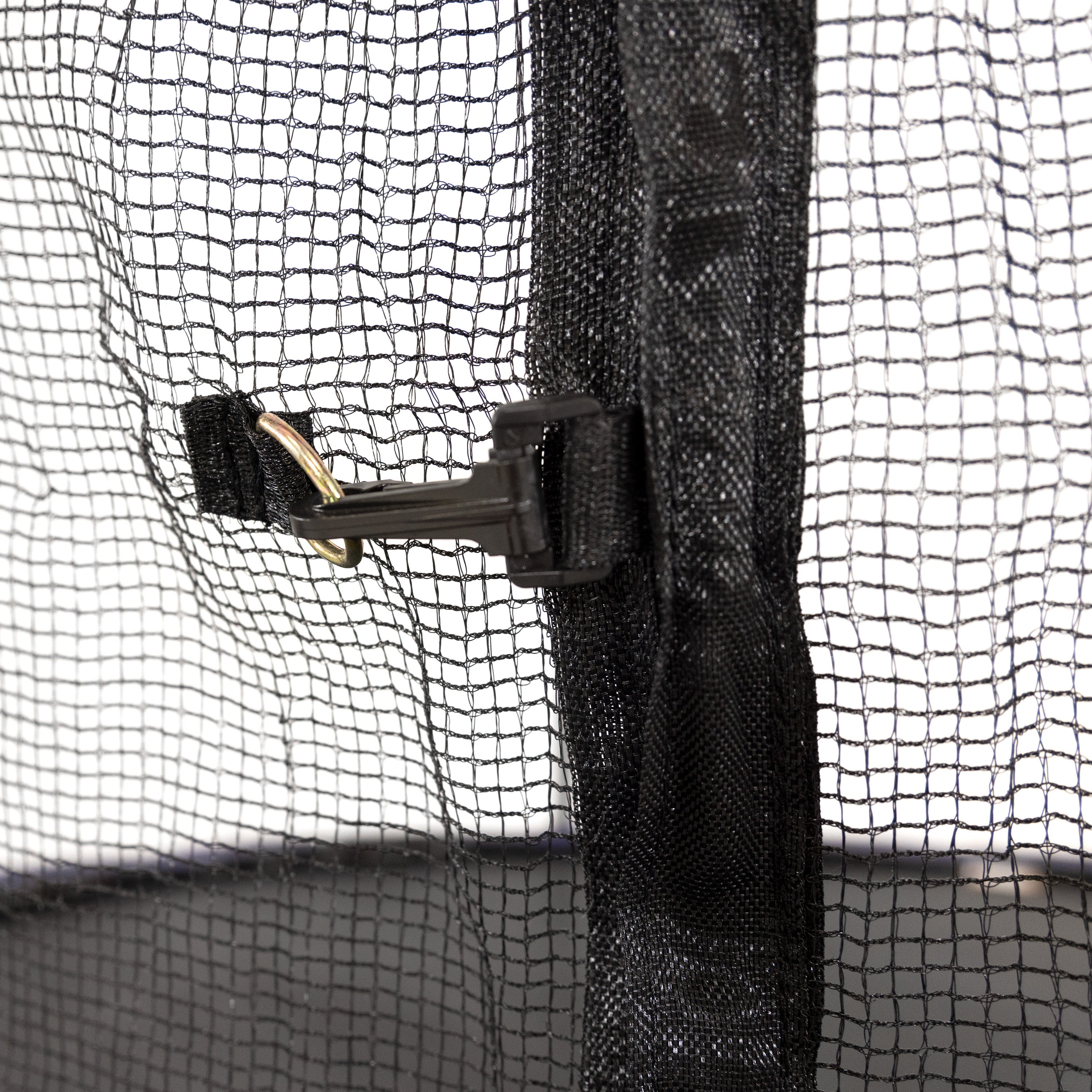 A black clip helps hold the enclosure net shut. 