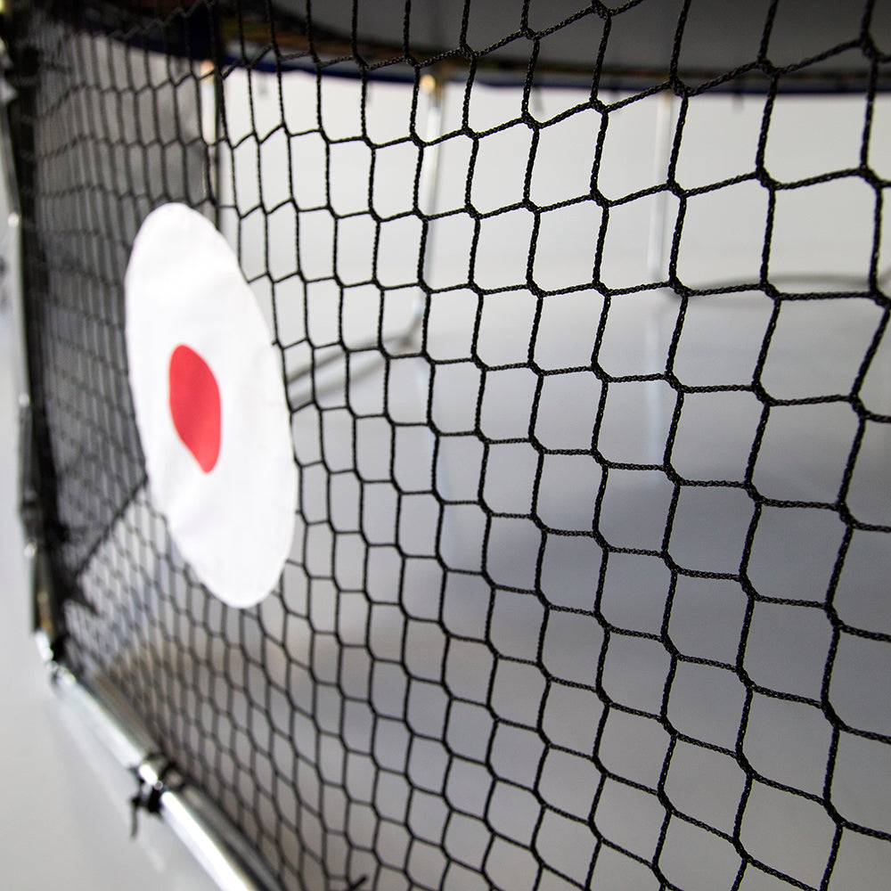 Close-up view of the black polyethylene netting on the Kickback Game net. 