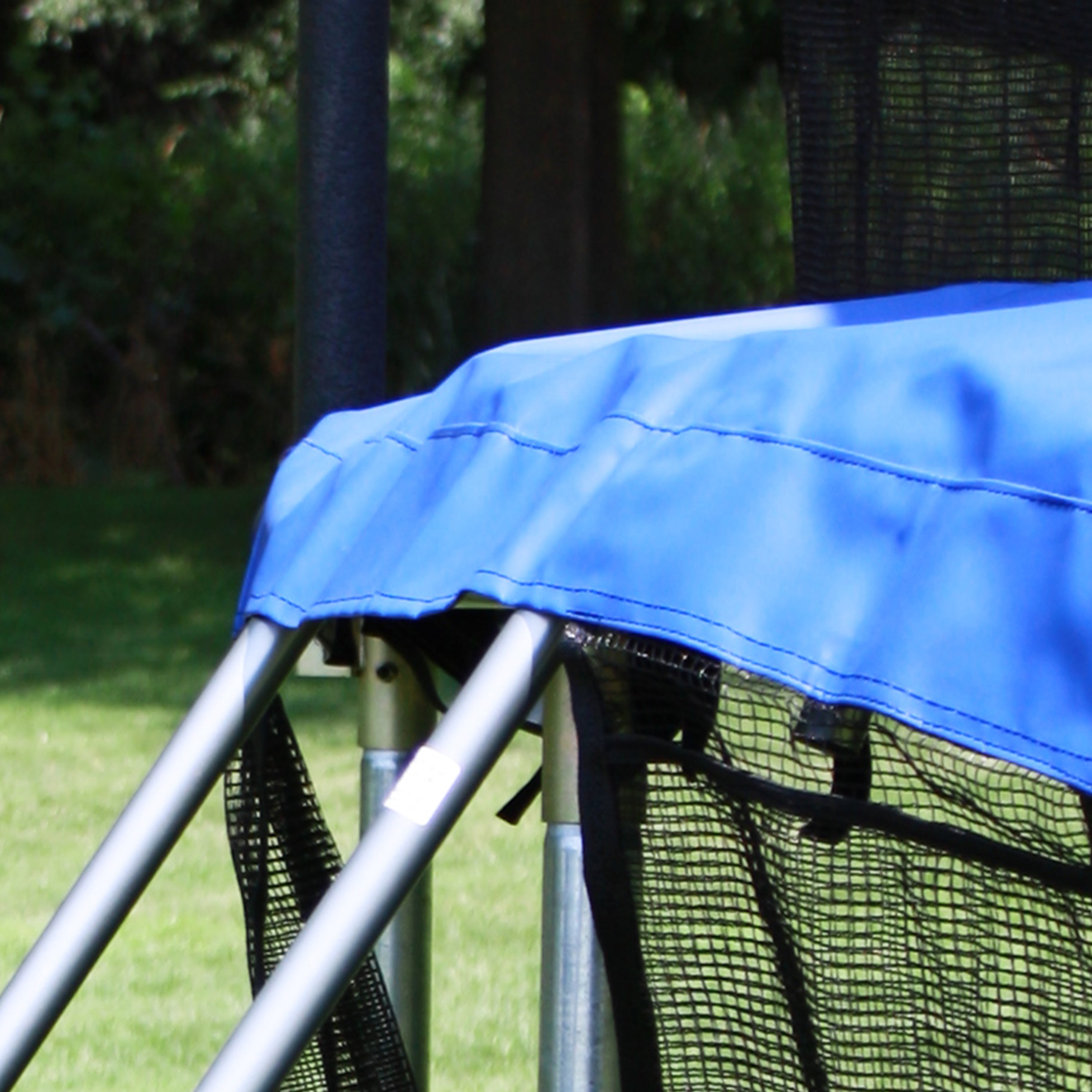 Blue door mat covers the top of the trampoline ladder. 