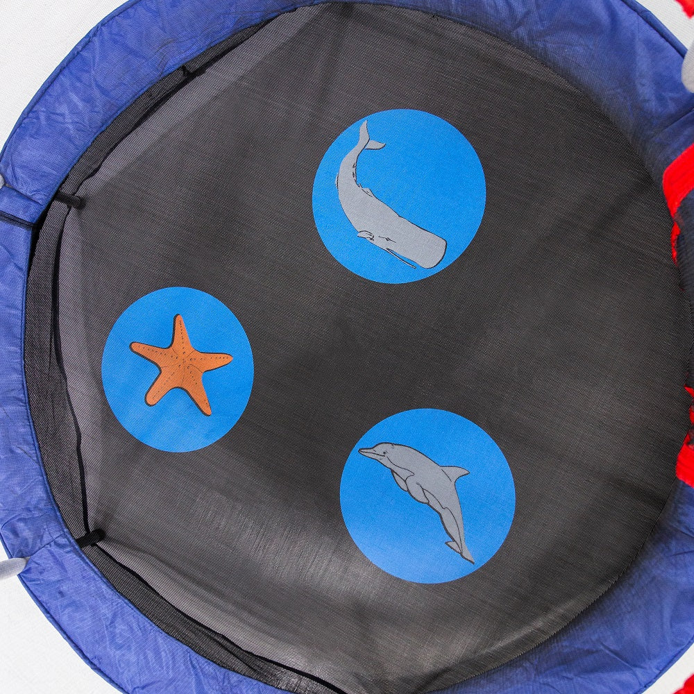 Whale, dolphin, and starfish design with blue background is on the black jump mat. 