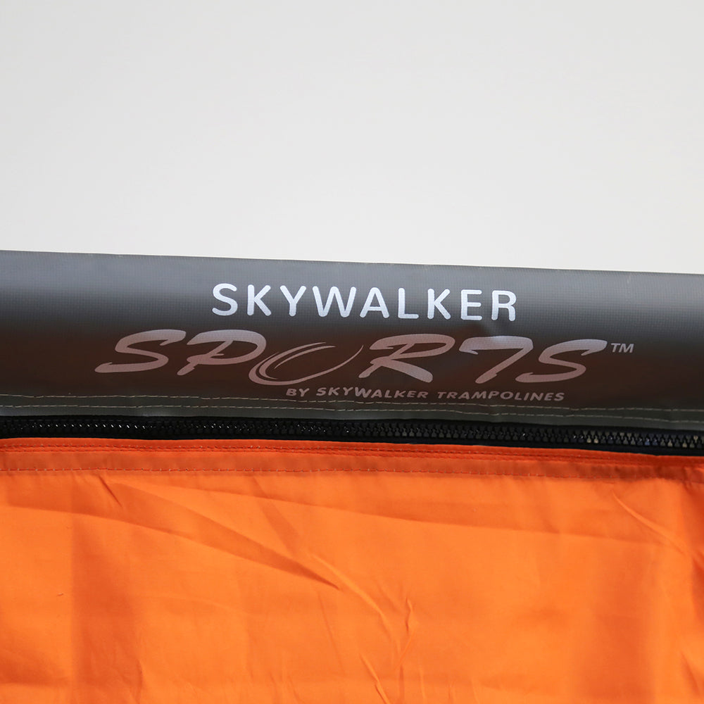 Close-up view of the white Skywalker Sports logo printed on black material. 