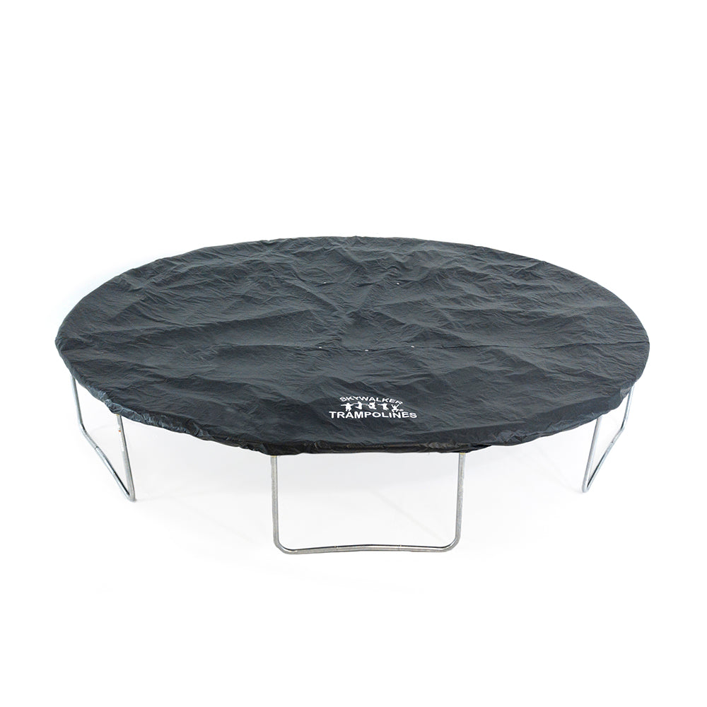 17-foot oval trampoline with black accessory weather cover on top of it. 