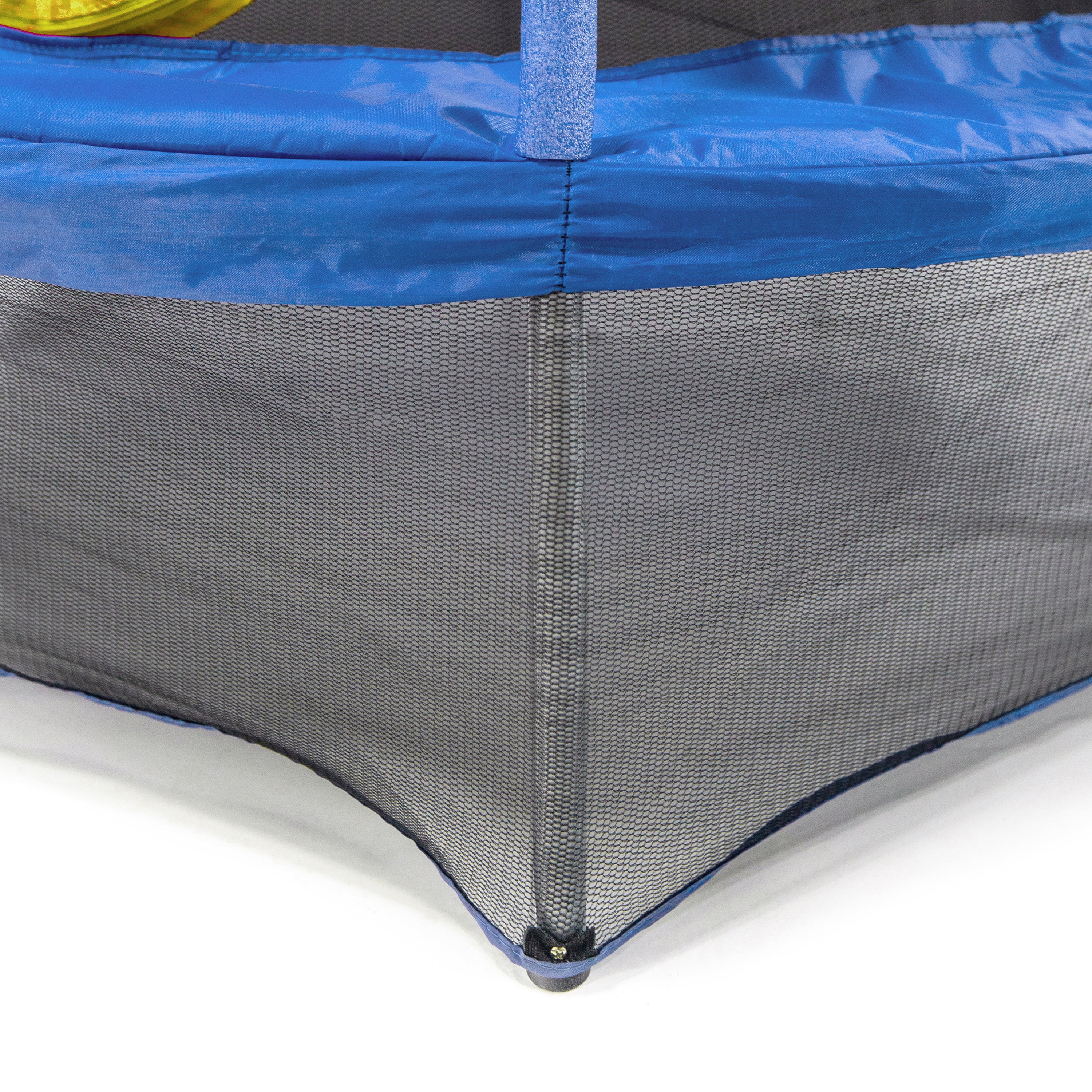 Black enclosure net hangs below the blue frame pad and covers the mini trampoline's legs. 